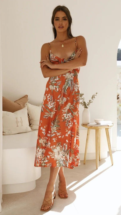 Flora | Romantisk midiklänning med blommönster 